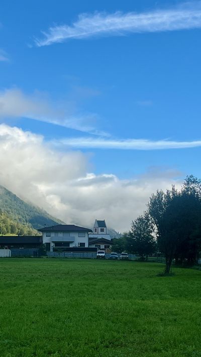 Meadow and rooftops at the edge of Heiligenblut