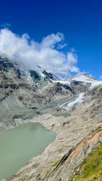 Steep cliff dropping toward the glacial lake