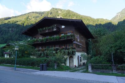 Pension Hirsch, a wooden balcony chalet on the road through Heiligenblut