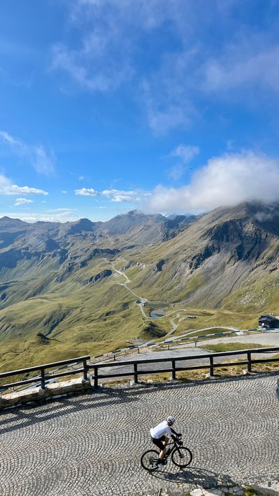 Cyclist climbing a steep switchback on the Grossglockner