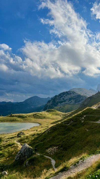 Grassy pass and distant peaks from Valparola