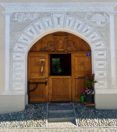 Star-patterned arch over a wooden door