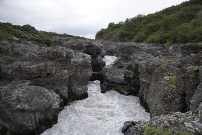 Black sand beach with crashing waves